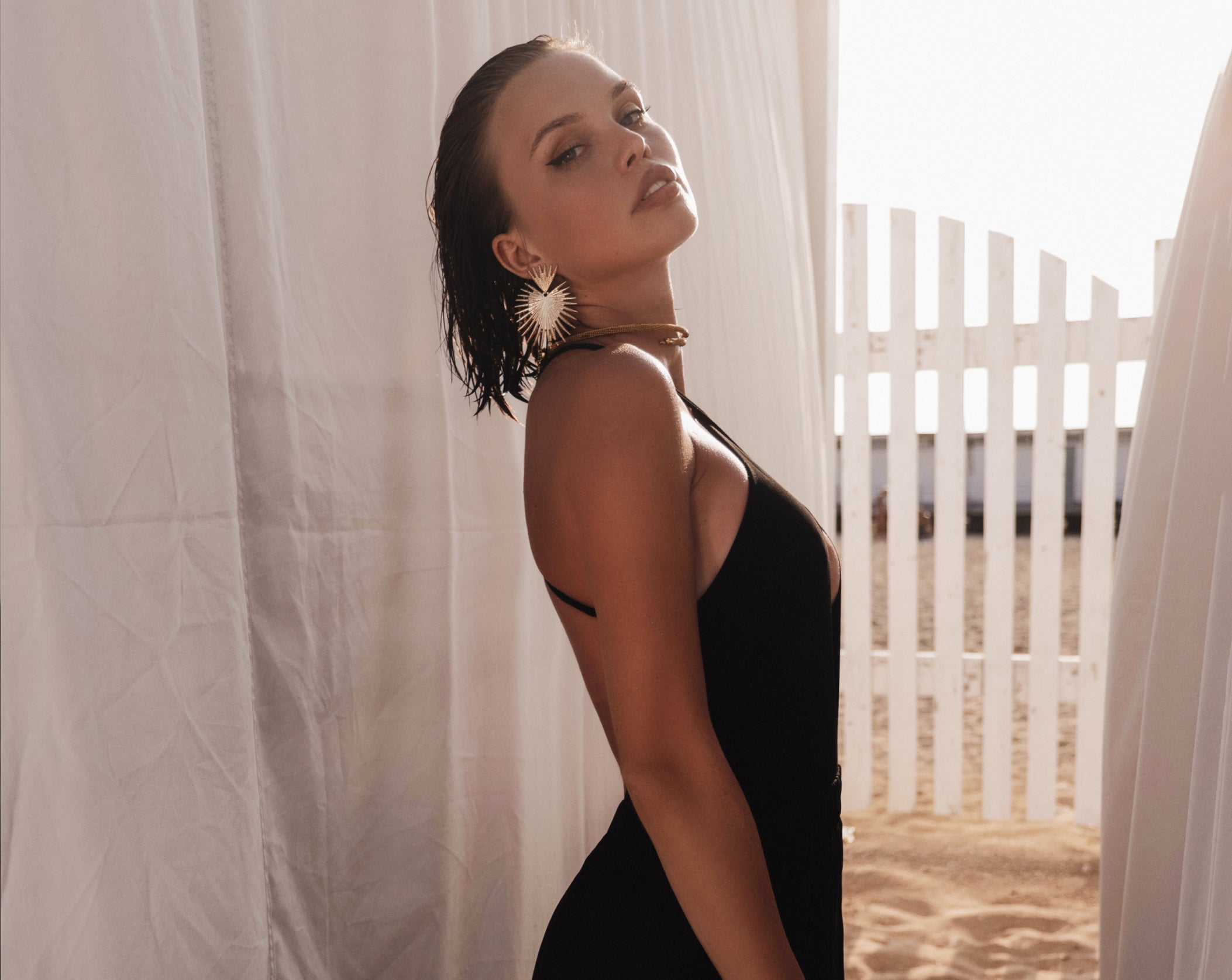 Sensual Summer Nights in Sleek Black Resortwear and Wet Look Glam